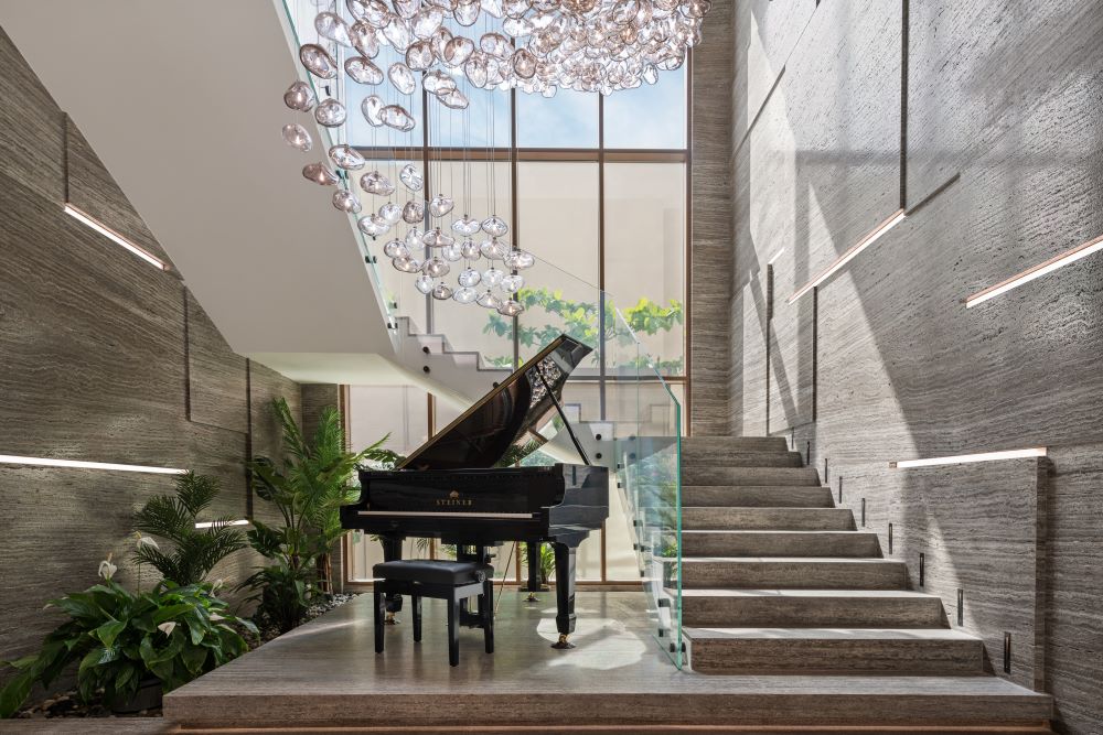 marble_staircase_light_strips_chandelier_garden_piano